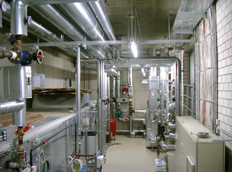 Technical room with distribution, pumps and heating controls